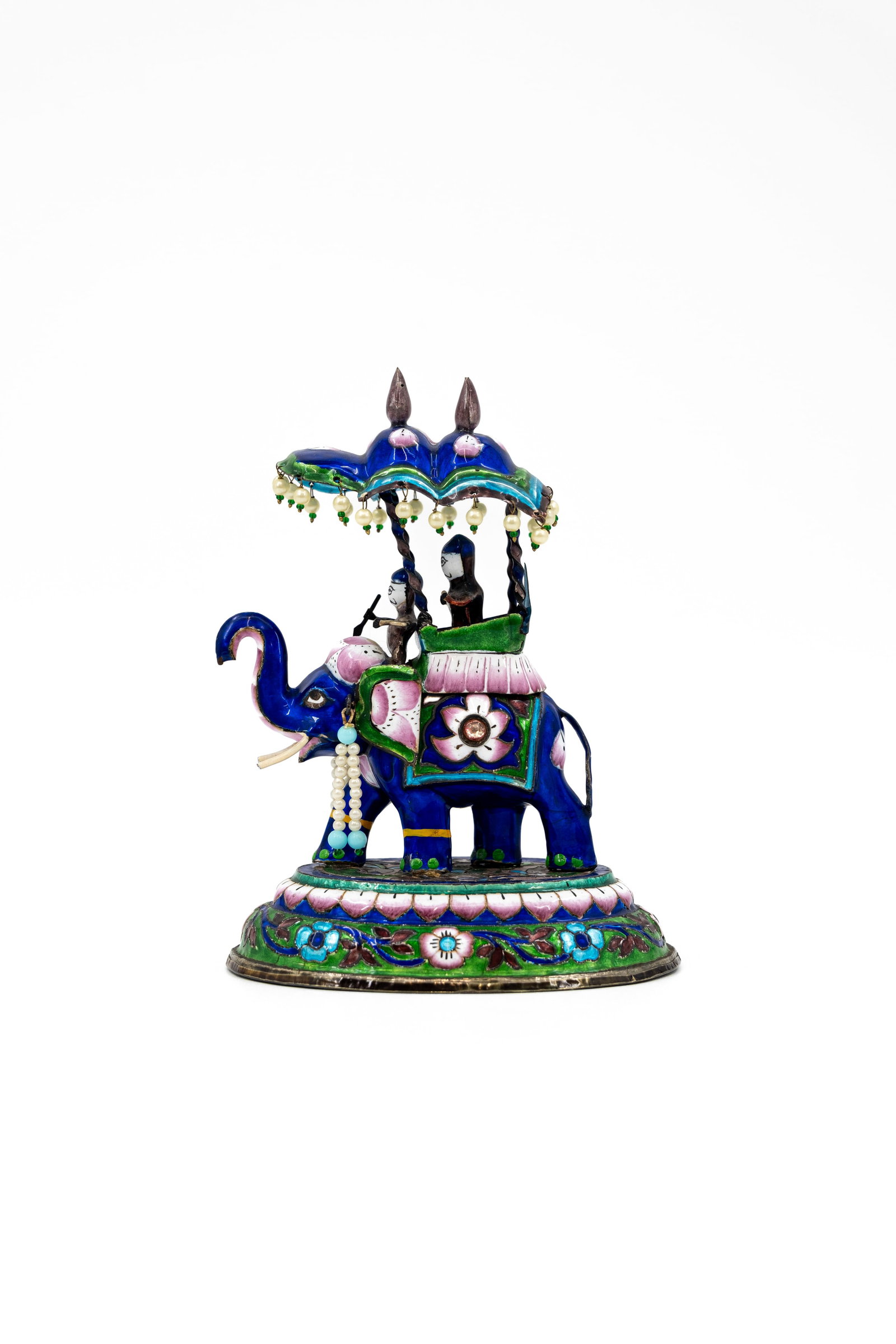 An Indian silver and enamel elephant with two riders.: An Indian silver and enamel elephant with two riders. H: 15,5 cm