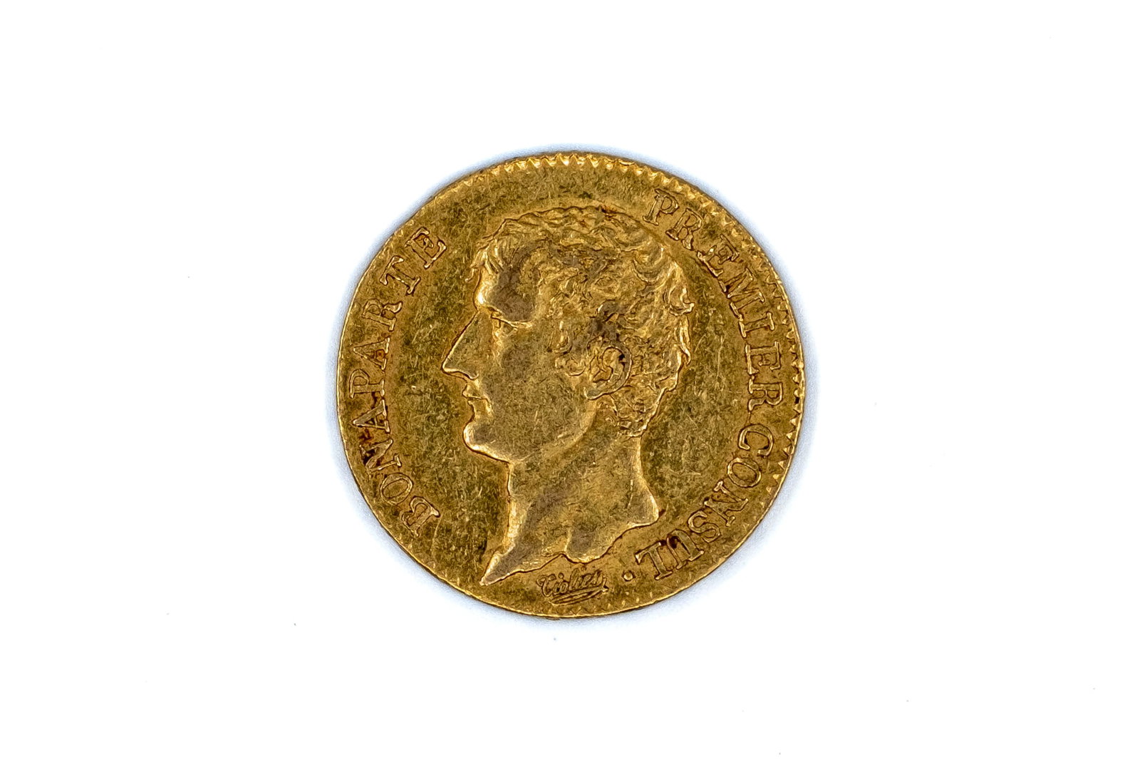 A French gold 20 Francs coin of Napoleon Bonaparte, dated An 12 (1 of 2)