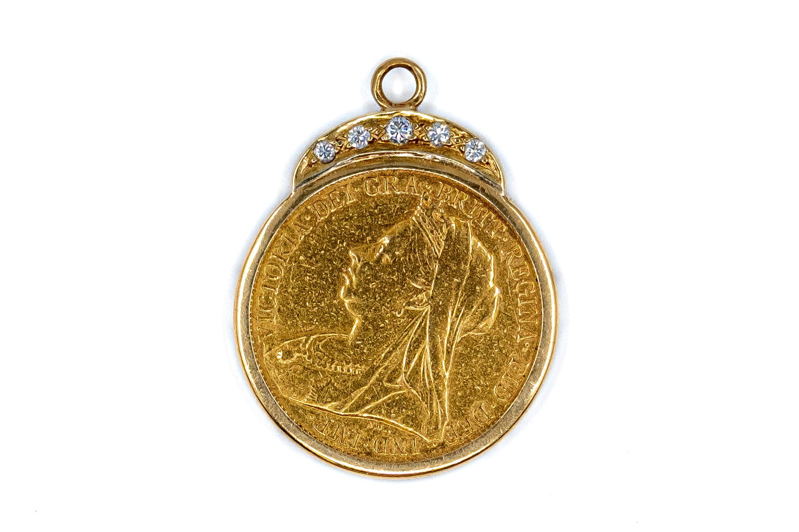 A British gold sovereign of Victoria, dated 1900: A British gold sovereign of Victoria, dated 1900, mounted in a gold pendant fitting set with five old-cut diamonds. With veiled bust of Queen Victoria left on the obverse, and Saint George slaying the