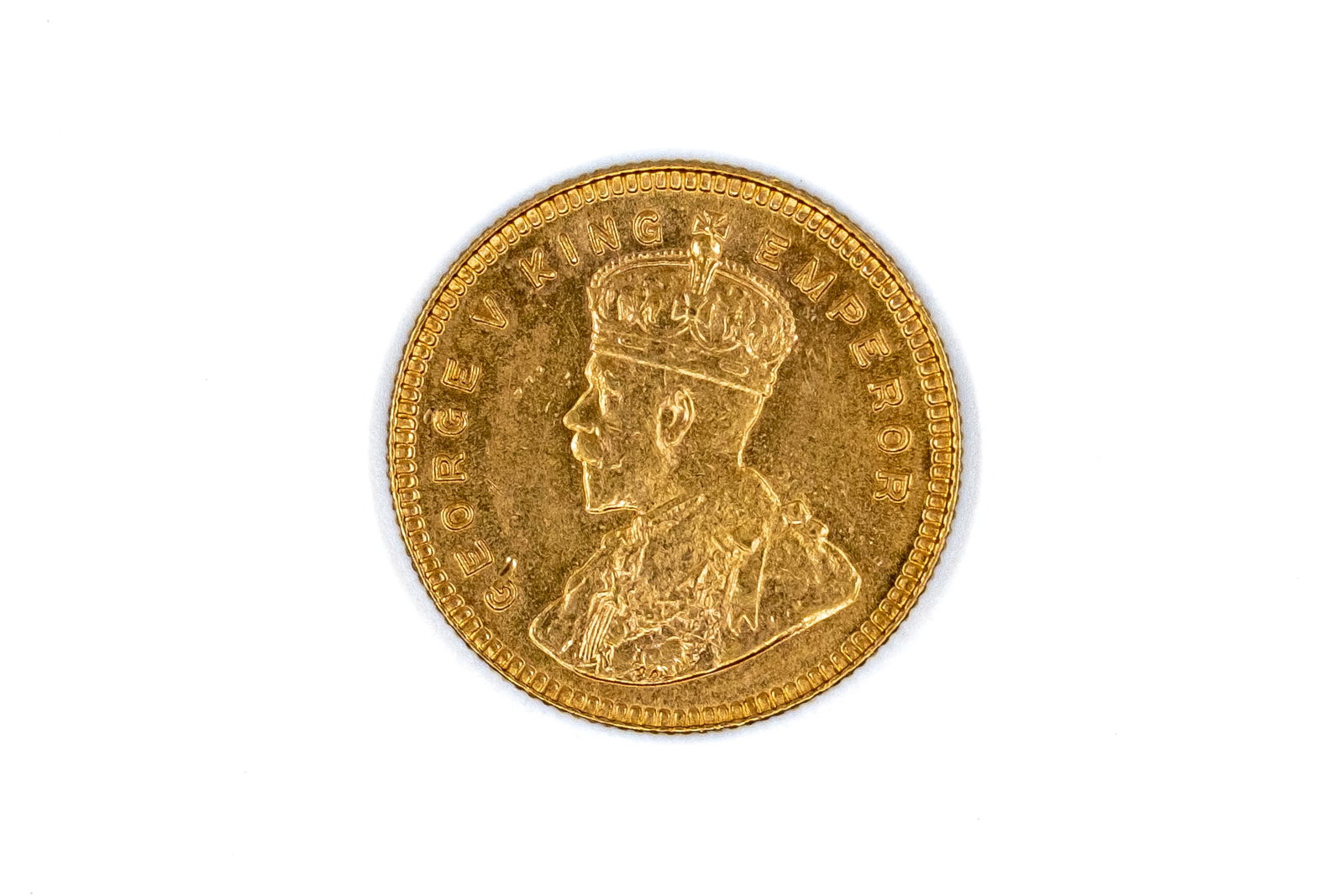 A British India gold 15 Rupees coin of George V, dated 1918 (1 of 2)
