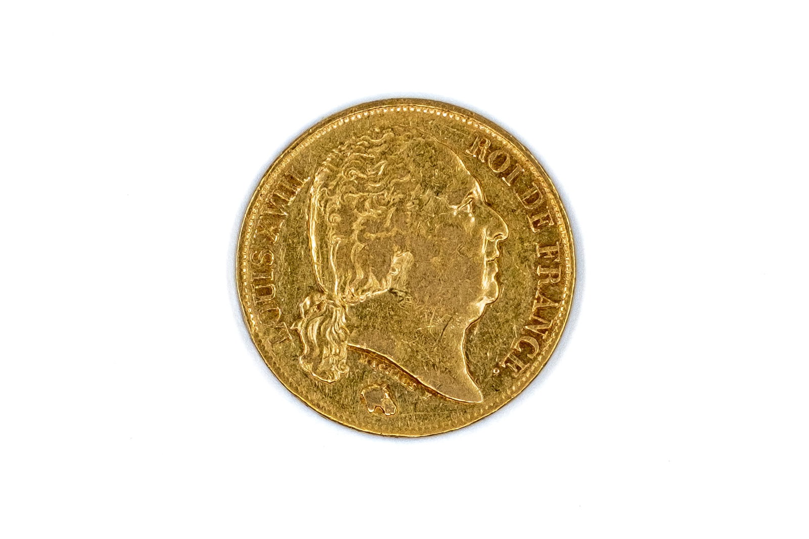 A French gold 20 Francs coin of Louis XVIII, dated 1818 (1 of 2)