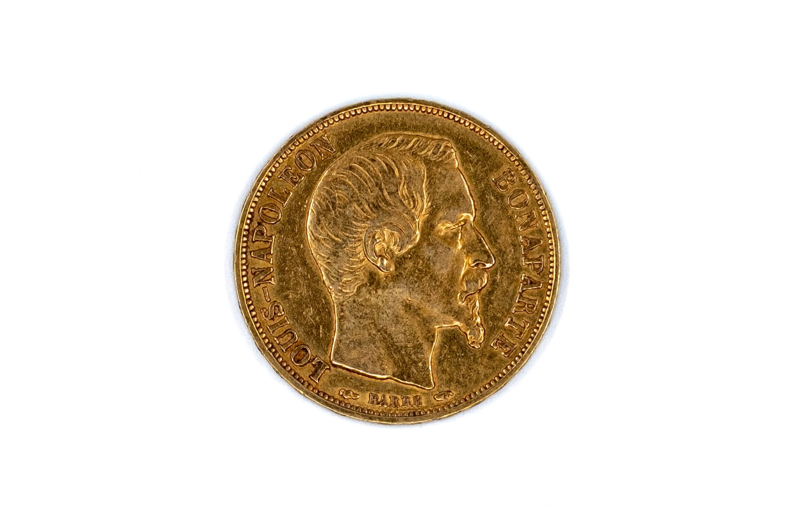 A French gold 20 Francs coin of Louis-Napoléon Bonaparte, dated 1852 (1 of 2)