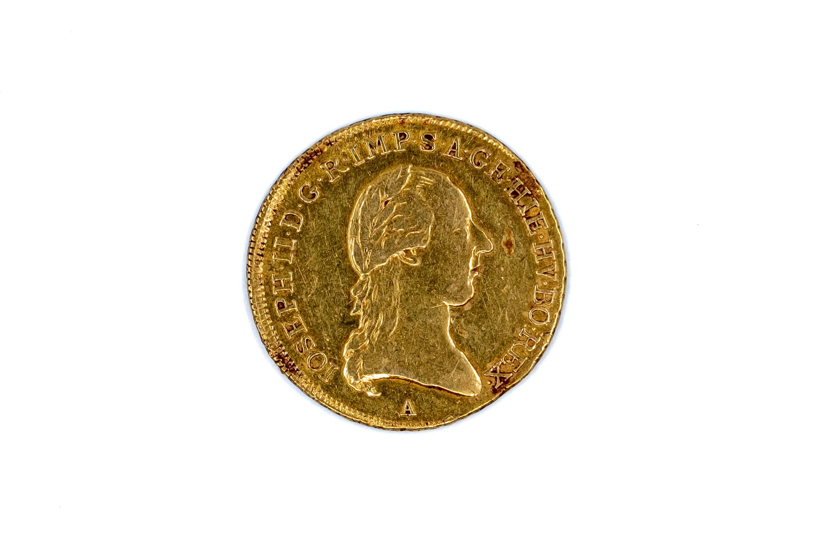 A gold coin of Joseph II, dated 1786: A gold coin of Joseph II, dated 1786. With laureate bust right on the obverse, and crowned shield of arms on the reverse. Weight: 5,5g