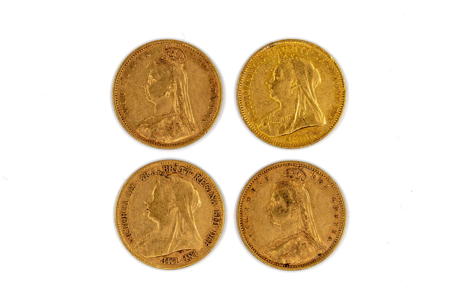 A lot of four British gold half sovereigns of Queen Victoria, dated 1890-1898: A lot of four British gold half sovereigns of Queen Victoria, dated 1890-1898. Comprising Jubilee head and veiled head issues, with crowned shield and St George slaying the dragon reverses. Total weig