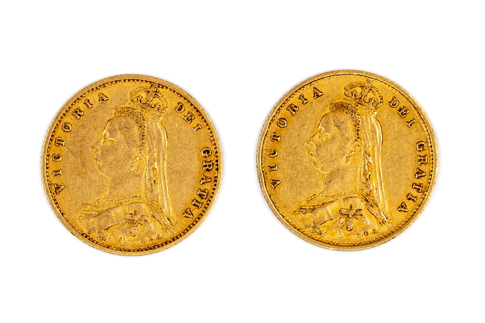 A lot of two British gold half sovereigns of Queen Victoria, dated 1887: A lot of two British gold half sovereigns of Queen Victoria, dated 1887. Comprising Jubilee head issues, with crowned shield reverse. Total weight: 7,9g