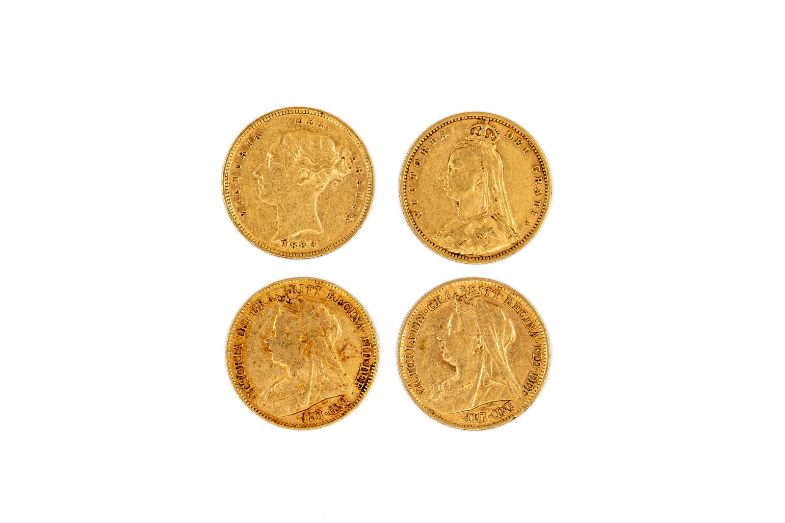 A lot of four British gold half sovereigns of Queen Victoria, dated 1883-1899: Lot 1031. A lot of four British gold half sovereigns of Queen Victoria, dated 1883-1899. Comprising young head, Jubilee head and veiled head issues, with crowned shield and St George slaying the drago