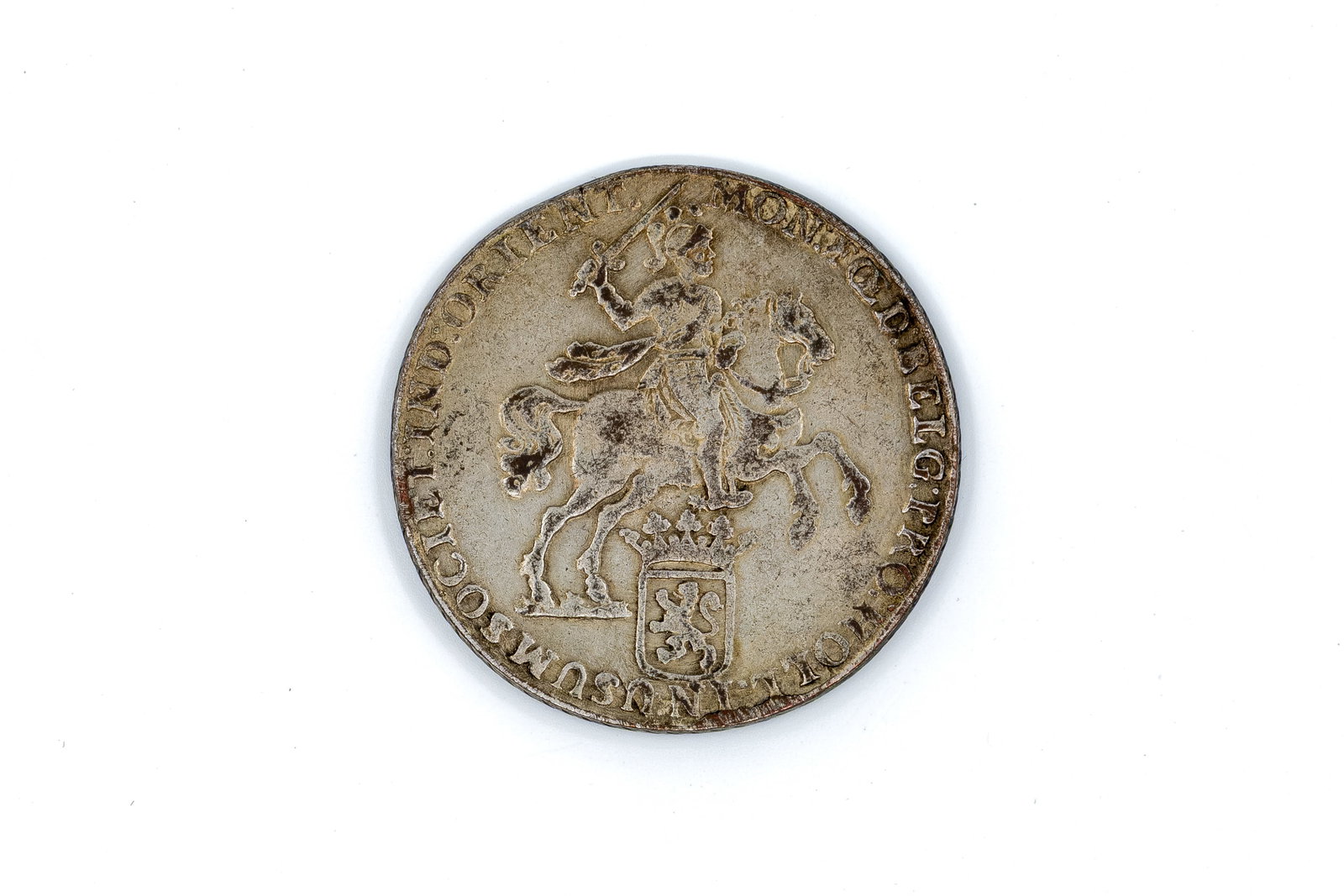 A Dutch silver rider ducat, dated 1739: A Dutch silver rider ducat, dated 1739. With armoured knight on horseback holding a sword on the obverse. Reverse with crowned shield supported by two lions and Latin inscription. Weight: 33,1g