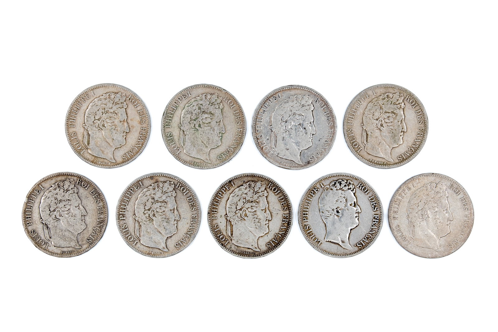 A lot of nine French silver 5 Francs coins of Louis-Philippe I, dated 1831-1841: A lot of nine French silver 5 Francs coins of Louis-Philippe I, dated 1831-1841. Comprising portrait issues of the king facing right, with "Louis Philippe I Roi des Français" on the obverse, and wrea
