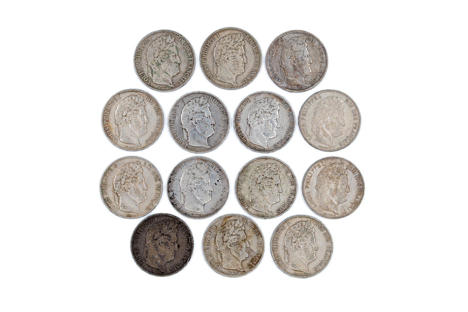 A lot of 14 French silver 5 Francs coins of Louis Philippe I: A lot of 14 French silver 5 Francs coins of Louis Philippe I, dated 1831-1848. All coins of the portrait type, with the obverse depicting the head of Louis Philippe I facing right, and the reverse sho