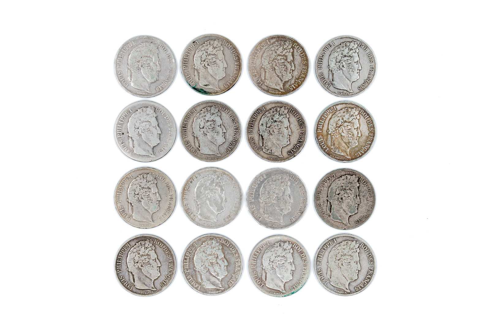 A lot of 16 French silver 5 Francs coins (Louis-Philippe I), dated 1834-1837: A lot of 16 French silver 5 Francs coins (Louis-Philippe I), dated 1834-1837. Comprising 5 Francs coins dated 1834, 1835, 1836, and 1837, with laurel wreath reverses and denomination within wreath. To