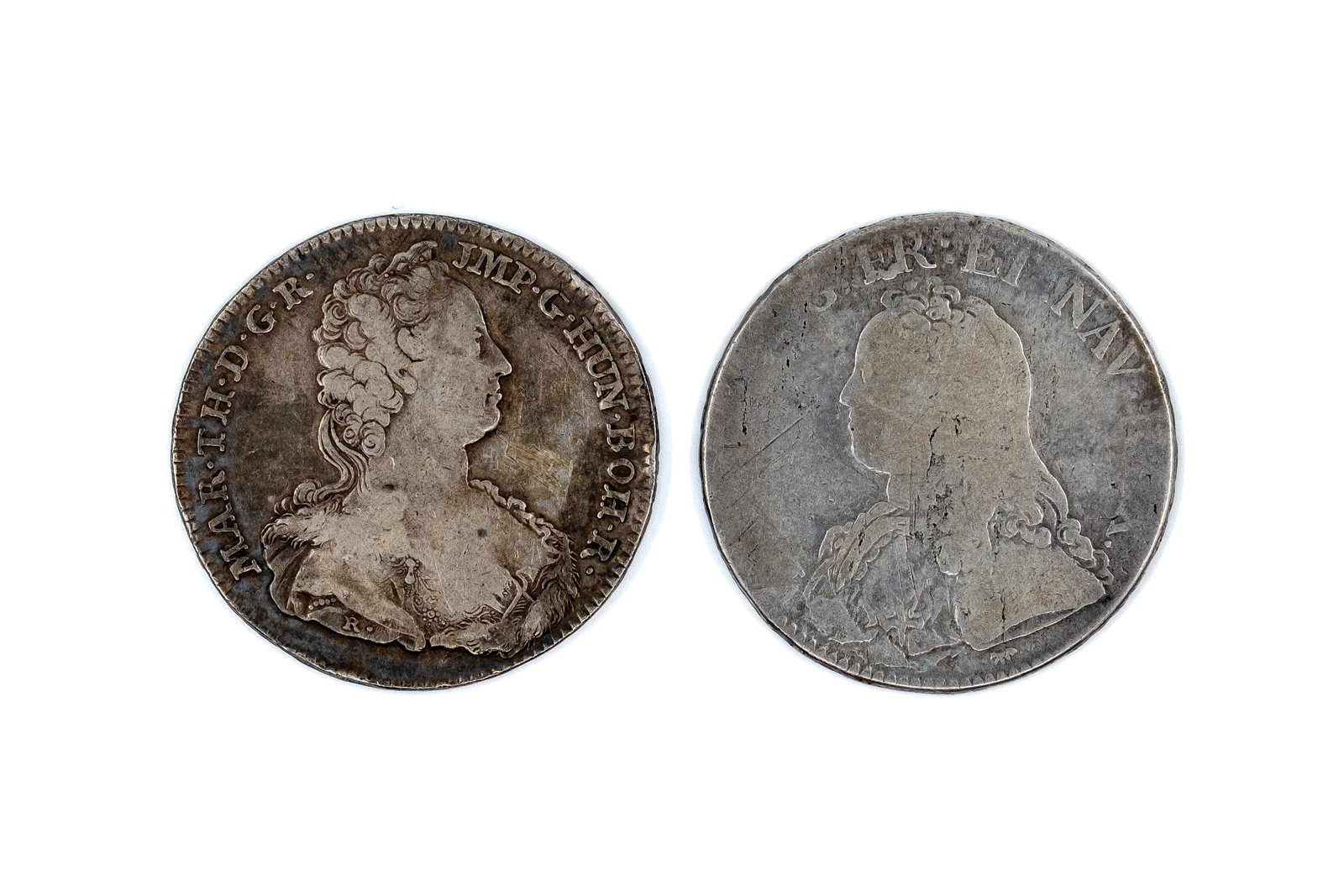 A lot of two silver coins, dated 1727-1752: A lot of two silver coins, dated 1727-1752. Comprising a French silver coin of Louis XV dated 1727, and an Austrian Netherlands silver coin of Maria Theresa dated 1752, with crowned arms on reverse. W