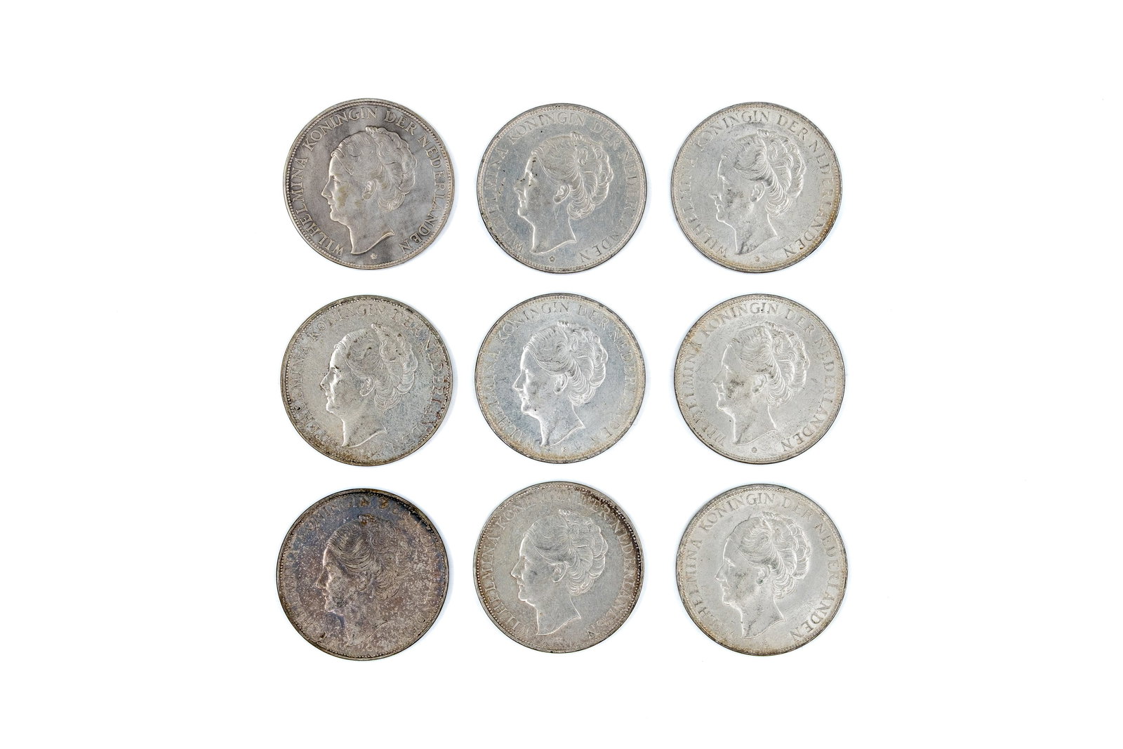 A lot of nine Dutch silver 2½ Gulden coins, dated 1930-1940 (1 of 2)