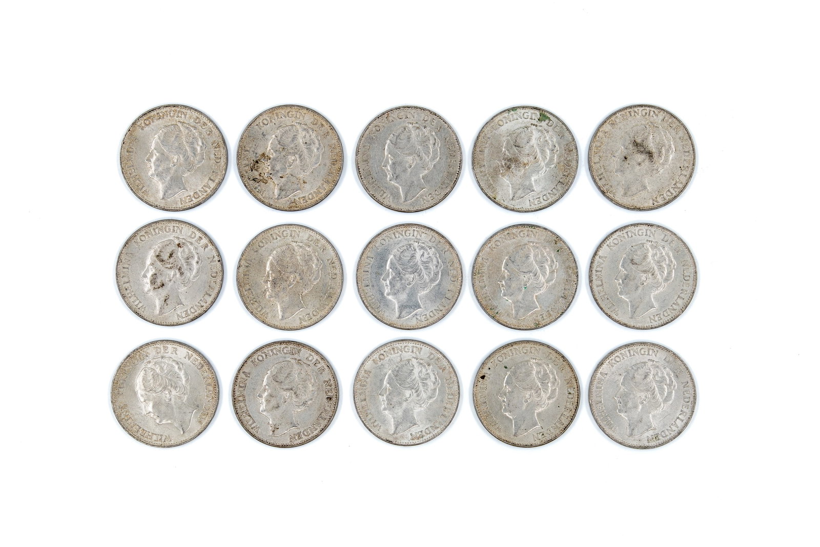 A lot of 15 Dutch silver 1 Gulden coins of Wilhelmina, dated 1931-1944 (1 of 2)
