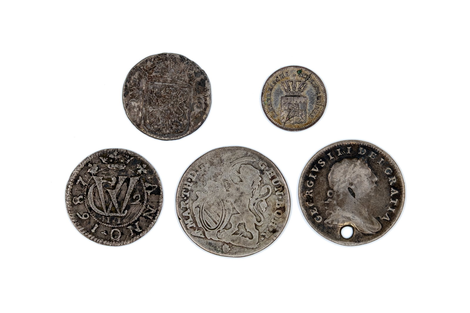 A lot of eight European silver coins and tokens, dated 1687-1870 (1 of 2)