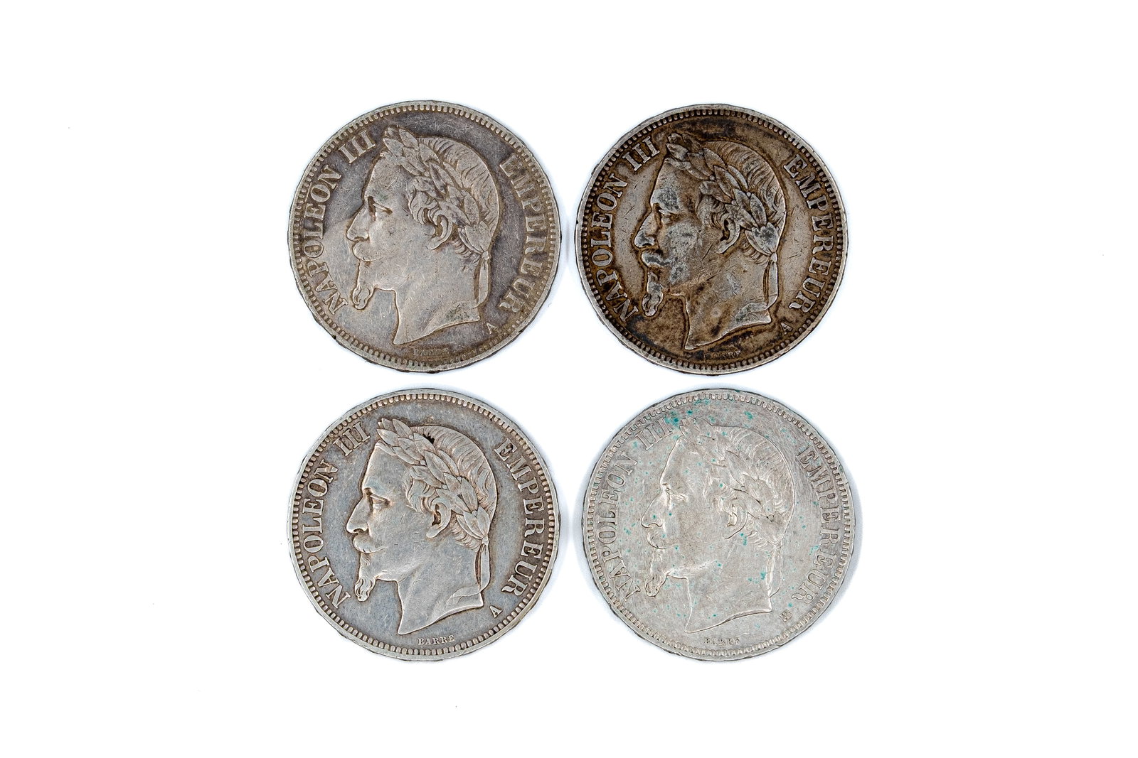 A lot of four French silver 5 francs coins of Napoleon III, dated 1868-1870: A lot of four French silver 5 francs coins of Napoleon III, dated 1868-1870. All issues with laureate head of Napoleon III on the obverse and imperial coat of arms reverse. Weight: 24,9 - 24,8 - 25 - 