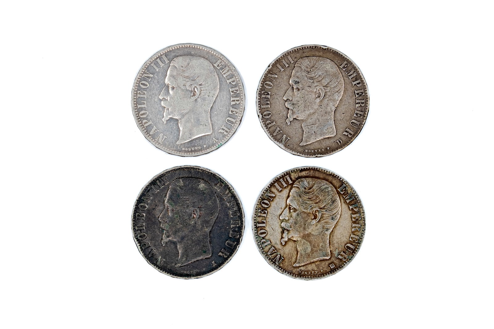 A lot of four French silver 5 francs coins of Napoleon III, dated 1855-1856 (1 of 2)
