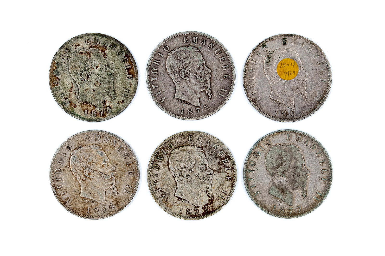 A lot of six Italian silver 5 Lire coins, Victor Emmanuel II, dated 1861-1877: A lot of six Italian silver 5 Lire coins, Victor Emmanuel II, dated 1861-1877. Featuring the portrait of Vittorio Emanuele II on the obverse and the crowned Savoy shield within wreath on the reverse. 