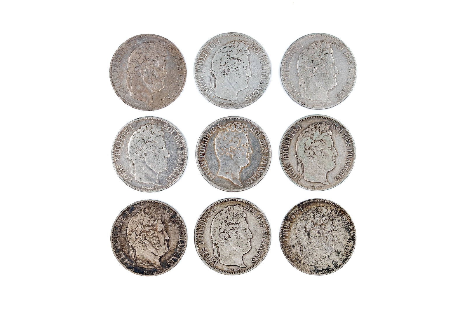 A lot of nine French silver 5 Francs coins, Louis Philippe I, dated 1831-1847: A lot of nine French silver 5 Francs coins, Louis Philippe I, dated 1831-1847. Comprising issues with bare and laureate head on the obverse and wreath with denomination on the reverse. Total weight: 2