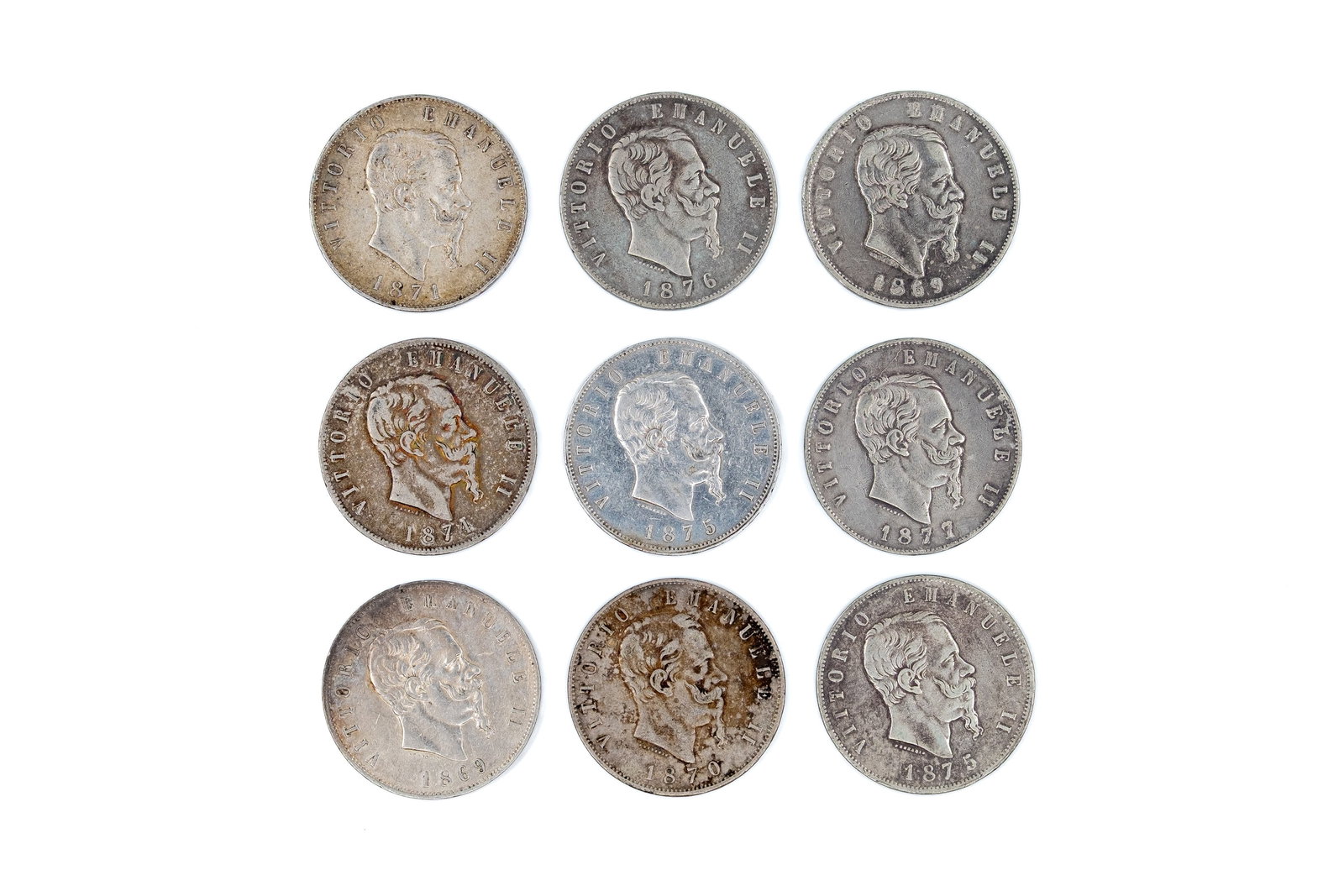 A lot of nine Italian silver 5 Lire coins, Vittorio Emanuele II, dated 1861-1877: A lot of nine Italian silver 5 Lire coins, Vittorio Emanuele II, dated 1861-1877. All issues with portrait on the obverse and crowned shield with denomination on the reverse. Total weight: 224,4g