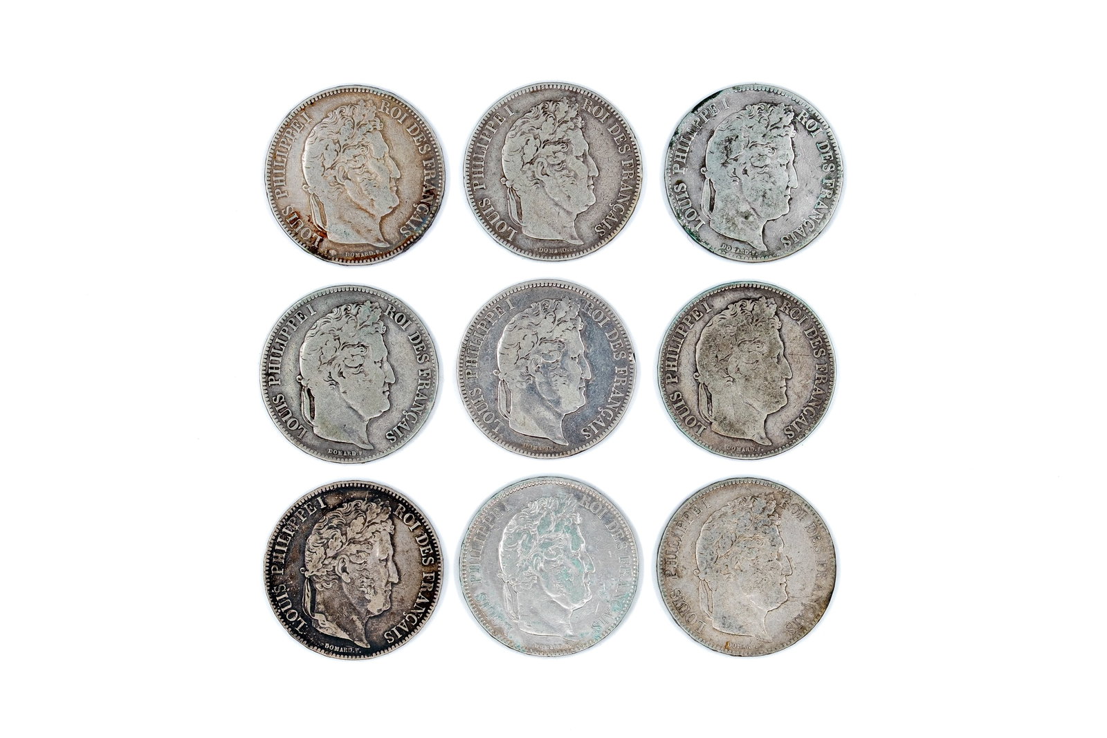 A lot of nine French silver 5 Francs coins, Louis-Philippe I, dated 1832-1837: A lot of nine French silver 5 Francs coins, Louis-Philippe I, dated 1832-1837. Obverse depicting a laureate head of Louis-Philippe I, reverse with wreath and denomination. Total weight: 222g