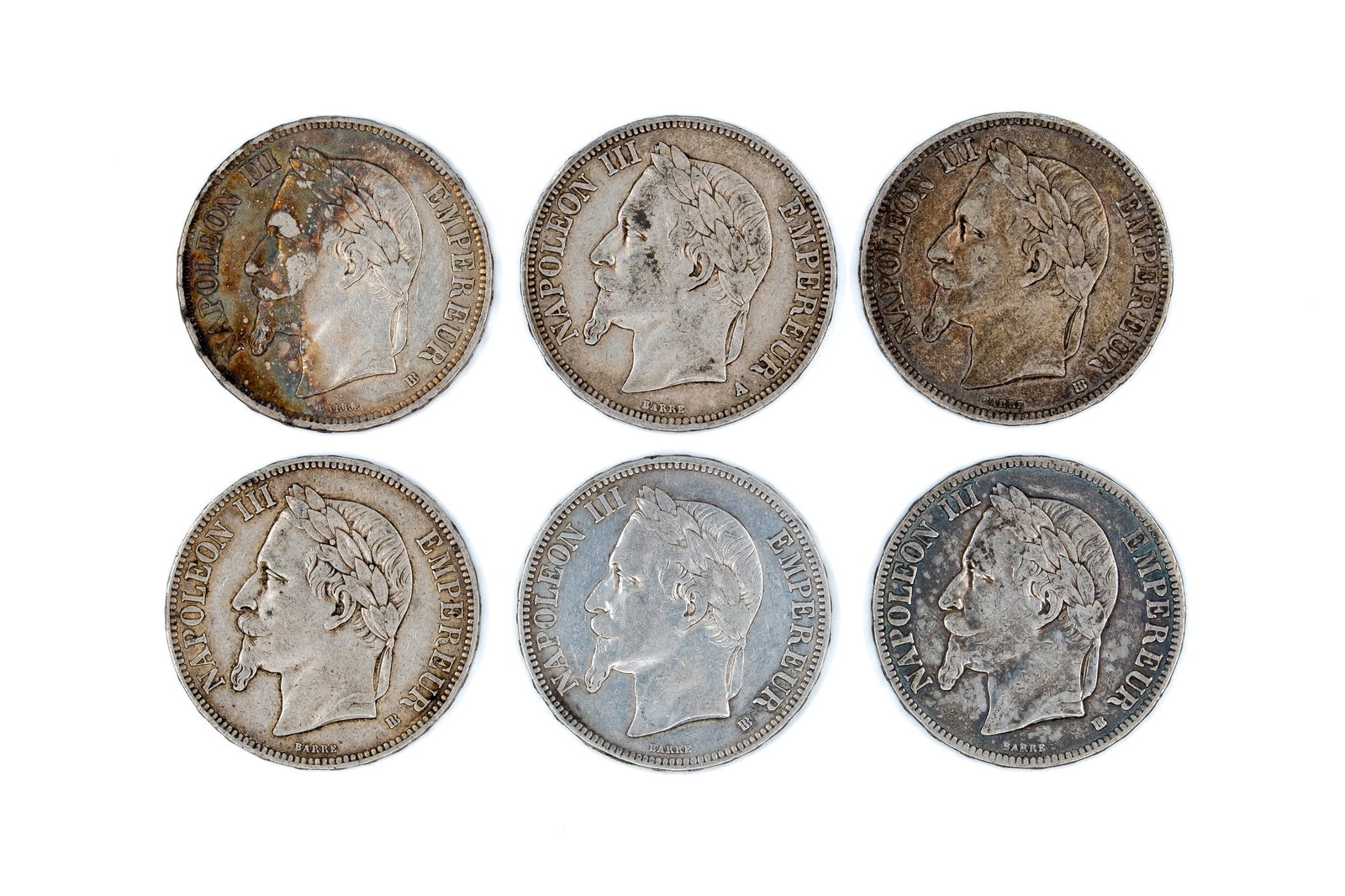 A lot of six French silver 5 Francs coins of Napoleon III, dated 1867-1869 (1 of 2)