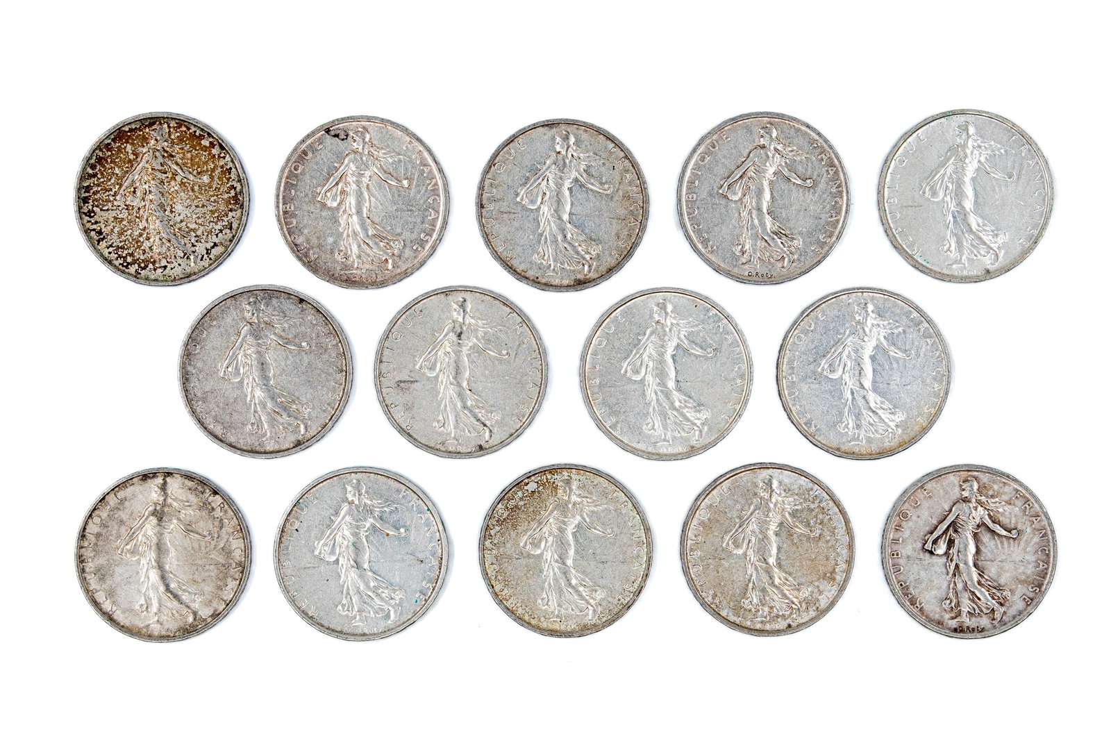 A lot of 14 French silver 5 Francs coins, dated 1960-1968: A lot of 14 French silver 5 Francs coins, dated 1960-1968. Comprising République Française issues of the Fifth Republic, of Semeuse type, featuring the standing Sower and olive branch reverse. Total