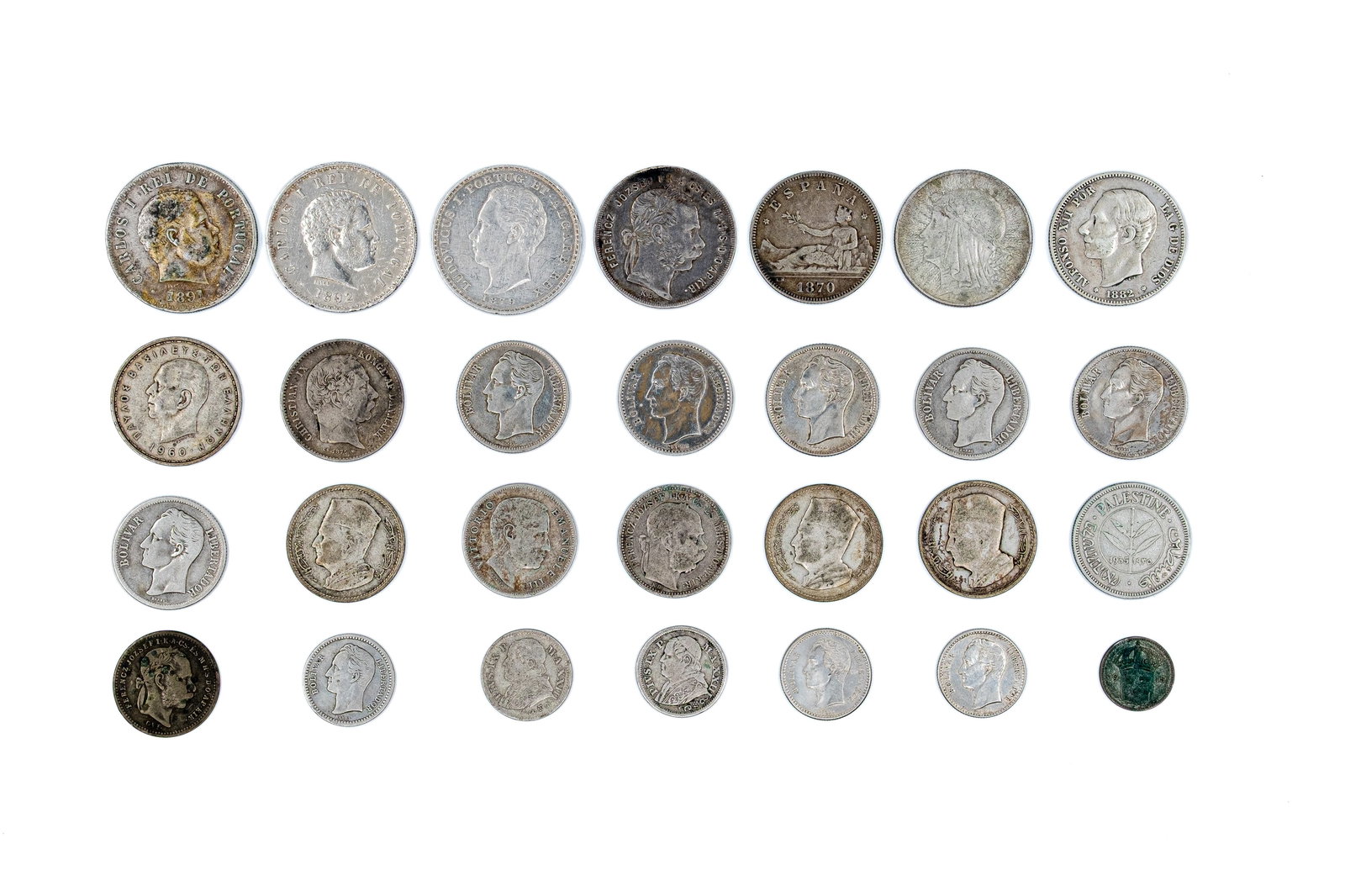 A lot of 28 assorted world silver coins, dated 19th-20th century: A lot of 28 assorted world silver coins, dated 19th-20th century. Comprising a varied group of European and overseas issues, including Portugal, Spain, Venezuela, Morocco, Palestine and other states, 