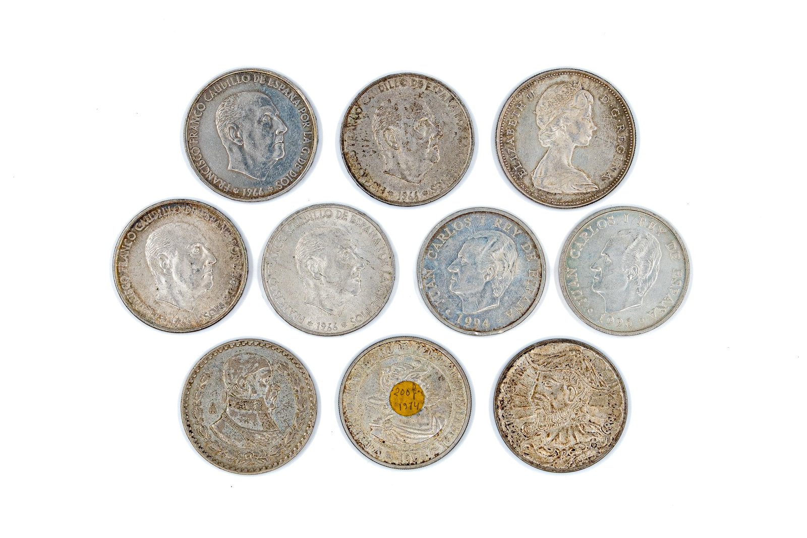 A lot of 10 Spanish silver coins and one Mexican silver coin, dated 20th century (1 of 2)