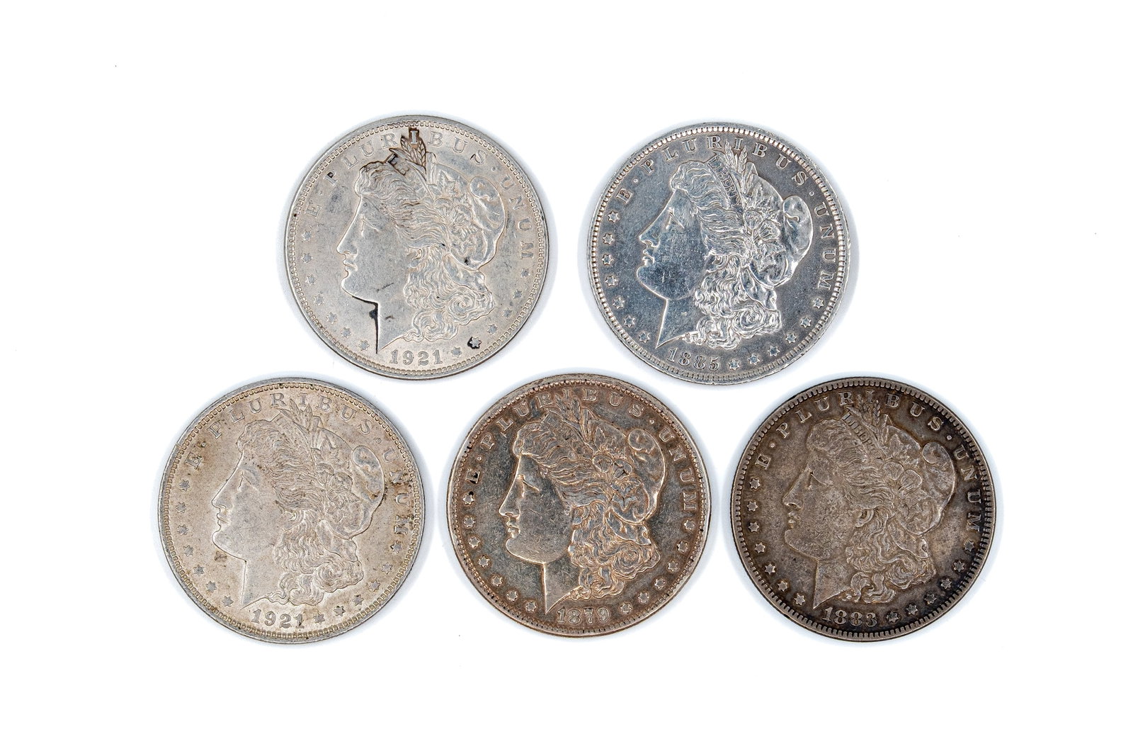 A lot of five United States silver dollars, dated 1879-1921 (1 of 2)