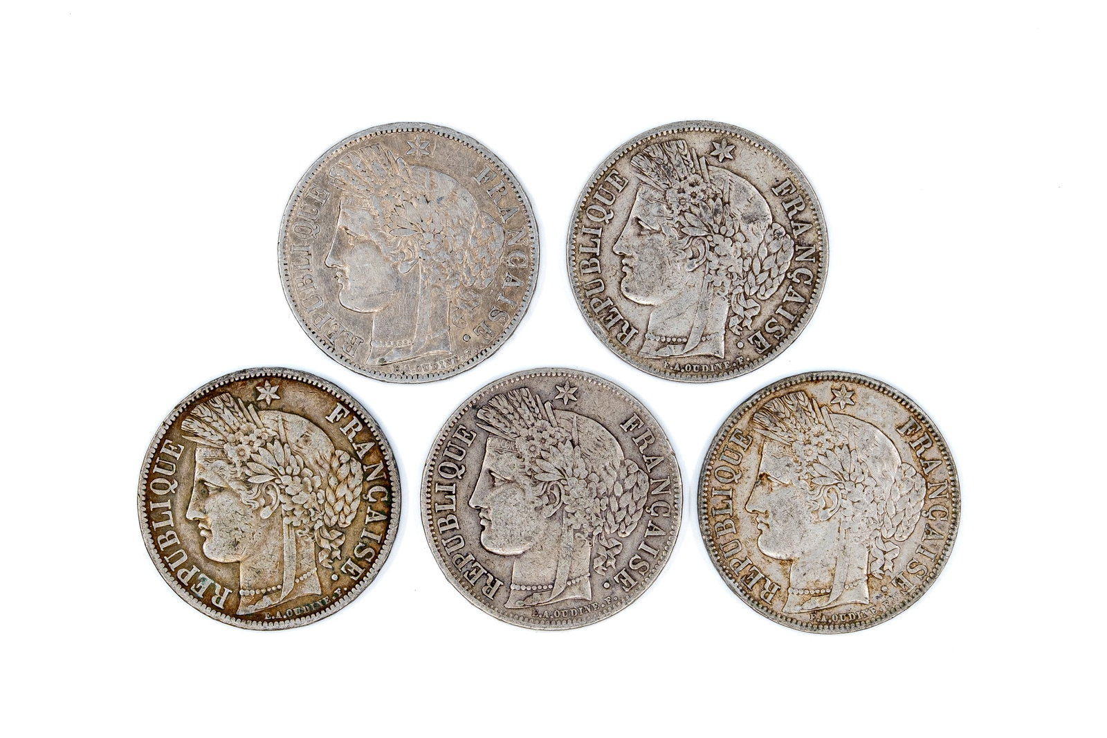 A lot of five French silver 5 Francs coins of the Second Republic, dated 1849-1851: A lot of five French silver 5 Francs coins of the Second Republic, dated 1849-1851. Comprising all silver issues with Ceres head obverse and wreath reverse enclosing the denomination. Total weight: 12