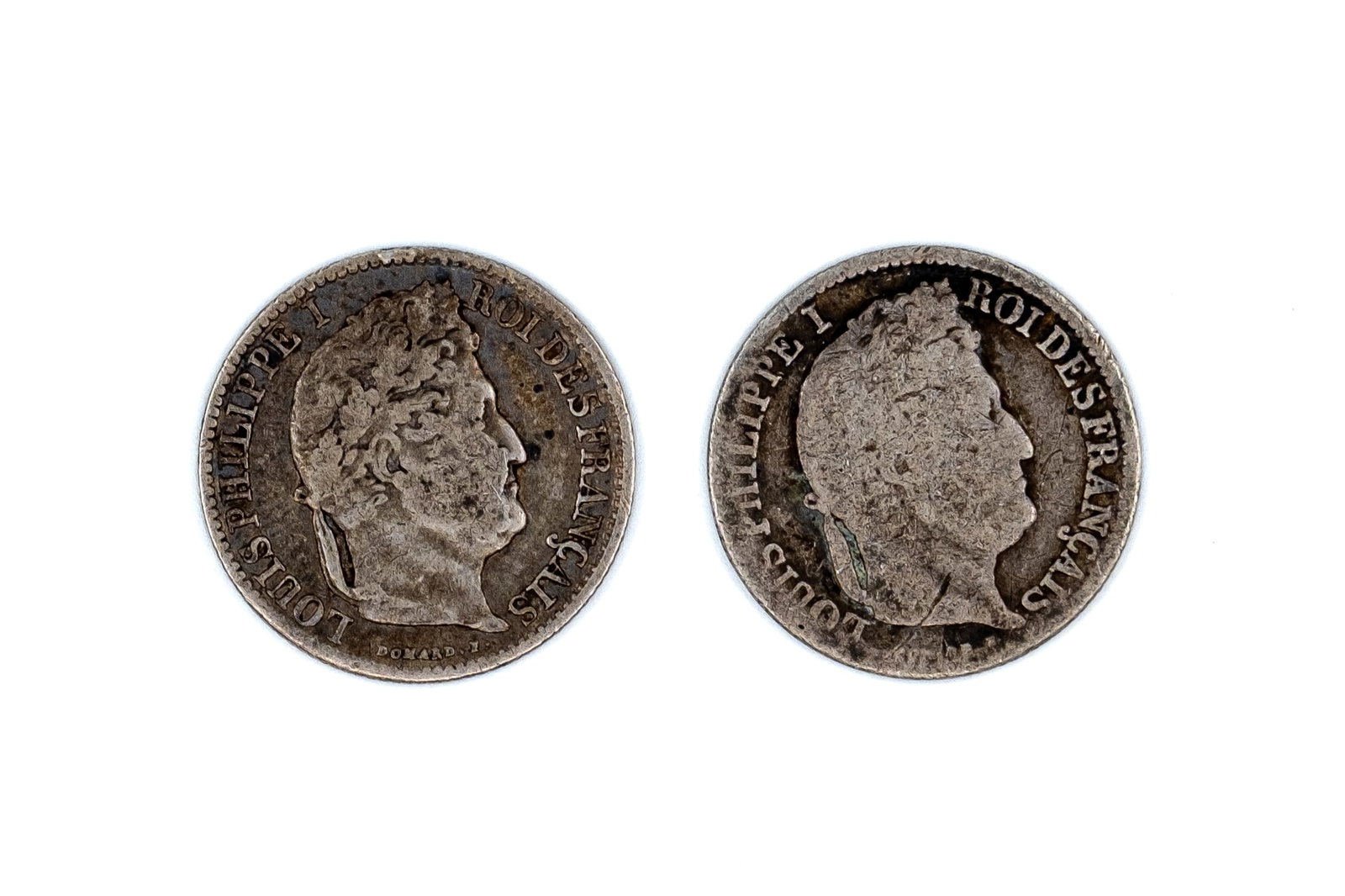 A lot of two French silver 1/2 Franc coins of Louis Philippe I, dated 1834-1837: A lot of two French silver 1/2 Franc coins of Louis Philippe I, dated 1834-1837. Both silver issues with wreath reverse and denomination within. Weight: 2,5 - 2,4g