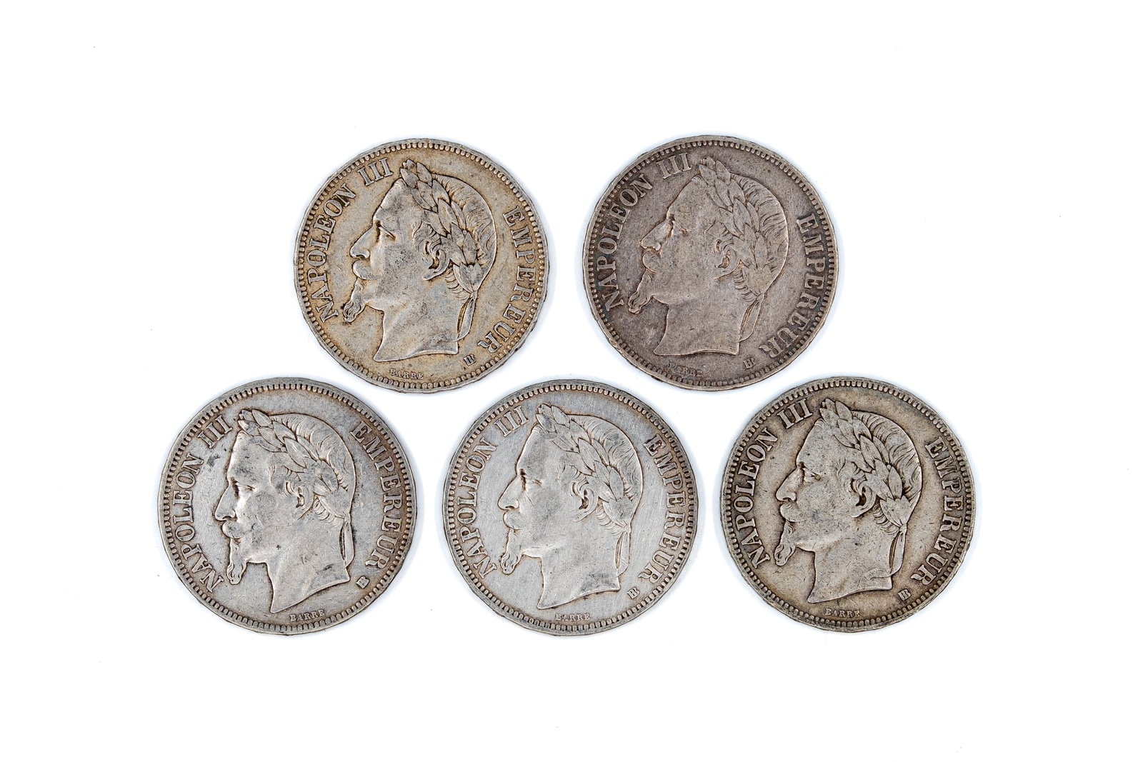 A lot of five French silver 5 Francs coins of Napoleon III, dated 1868-1869: A lot of five French silver 5 Francs coins of Napoleon III, dated 1868-1869. All Second Empire silver issues with laureate head of Napoleon III on the obverse, and the imperial arms with eagle, crown 