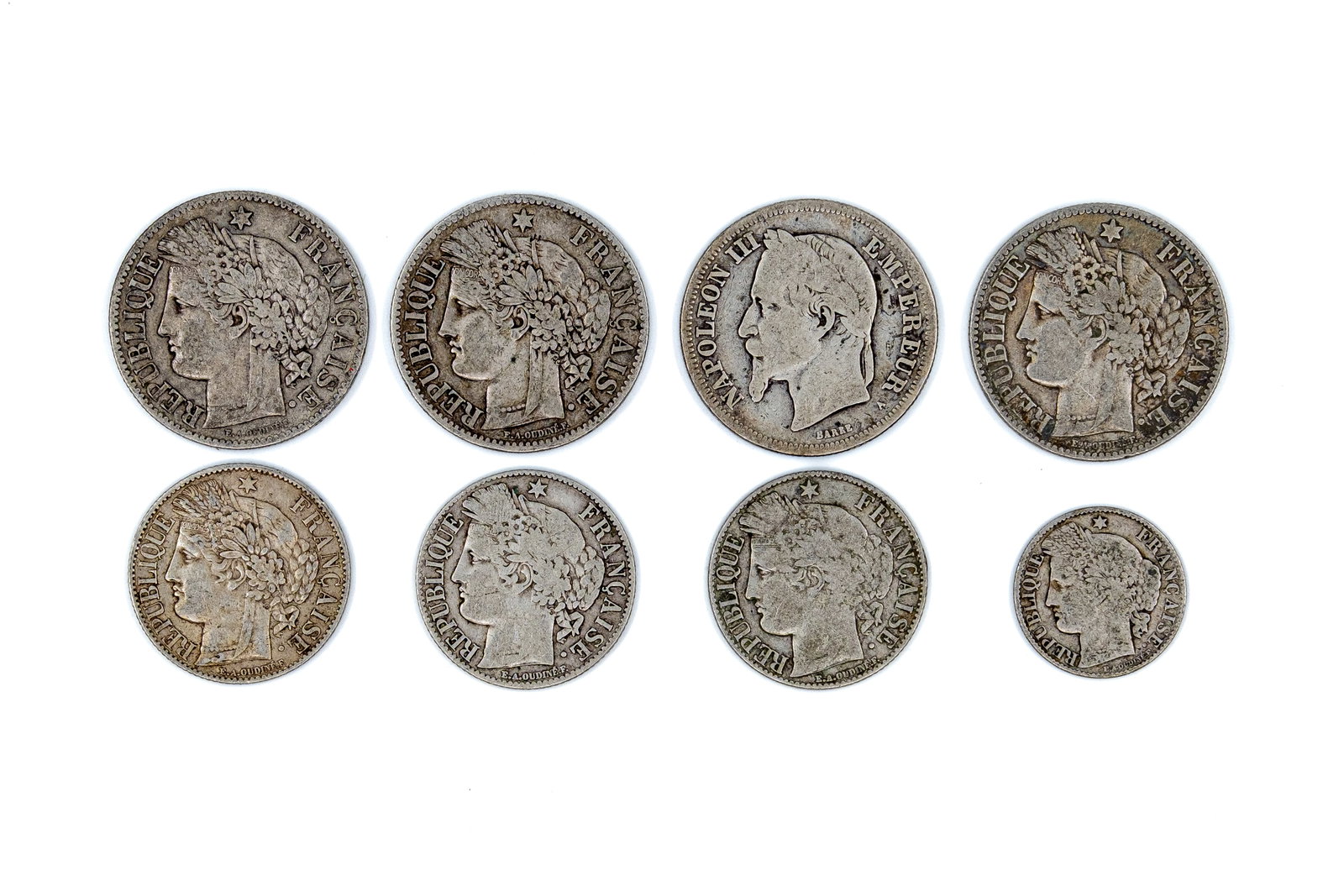 A lot of eight French silver coins, 19th century: A lot of eight French silver coins, 19th century. Comprising mainly later 19th-century Republican issues, together with one Napoleon III issue, in various denominations, with Ceres and imperial portra