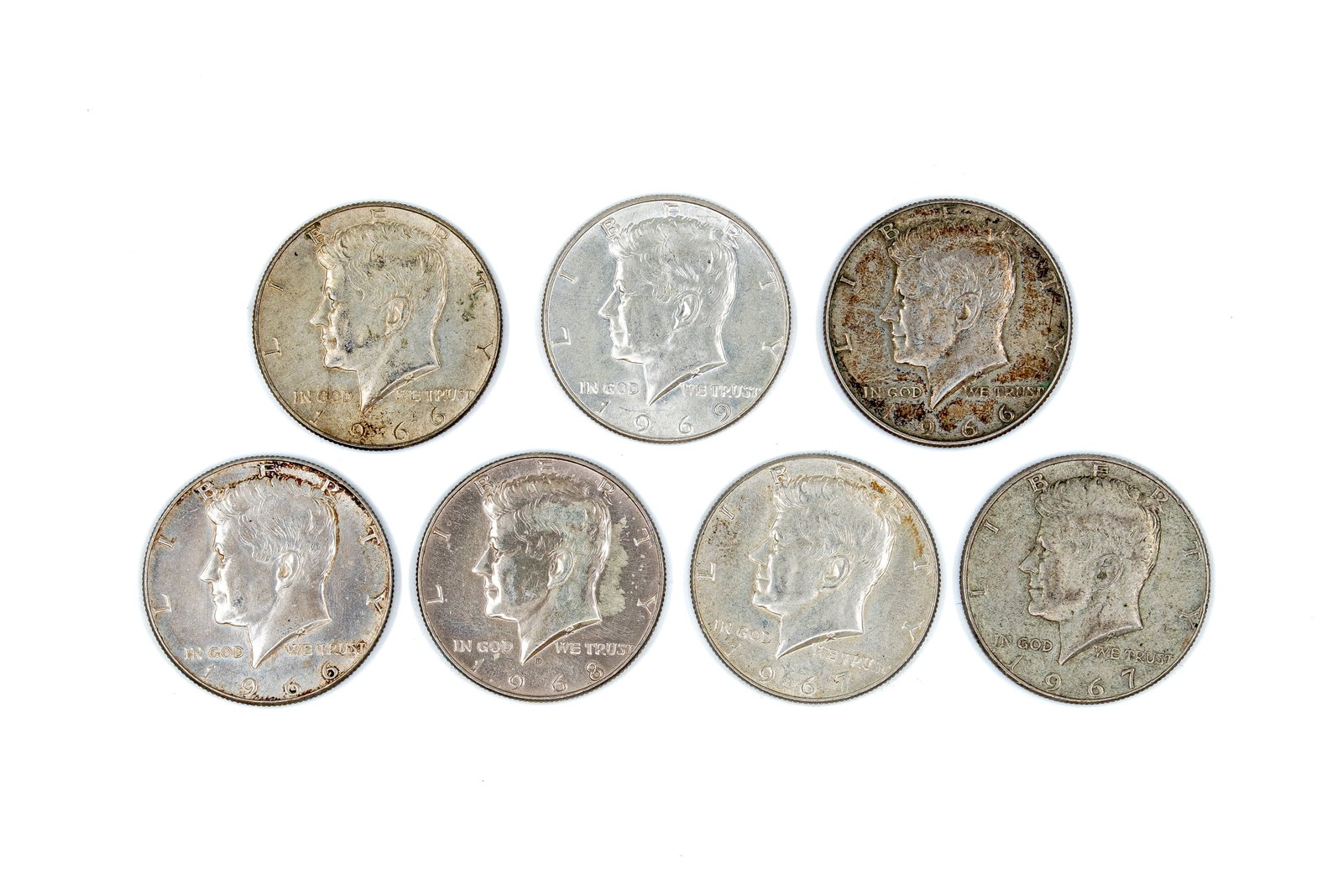 A lot of seven United States silver Kennedy Half Dollars, dated 1966-1969 (1 of 2)