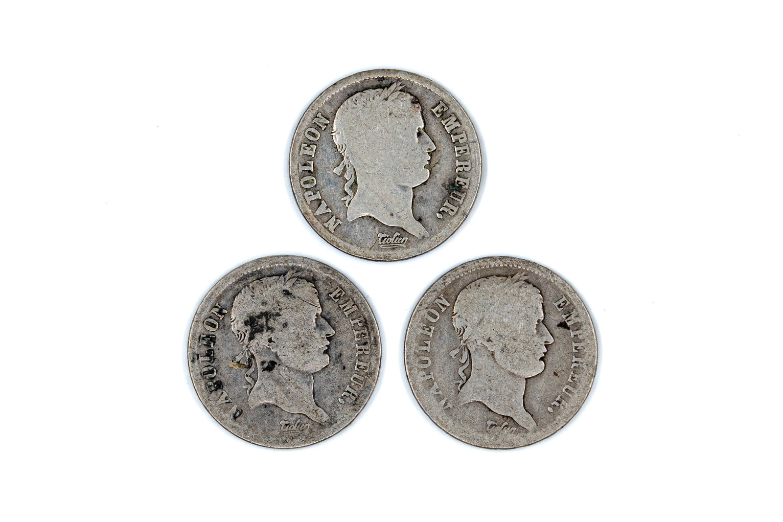 Three French silver 2 Francs coins of Napoleon I, dated 1811-1812: Three French silver 2 Francs coins of Napoleon I, dated 1811-1812. Comprising First Empire issues with laureate head of Napoleon I on the obverse, and denomination within wreath on the reverse. Weight