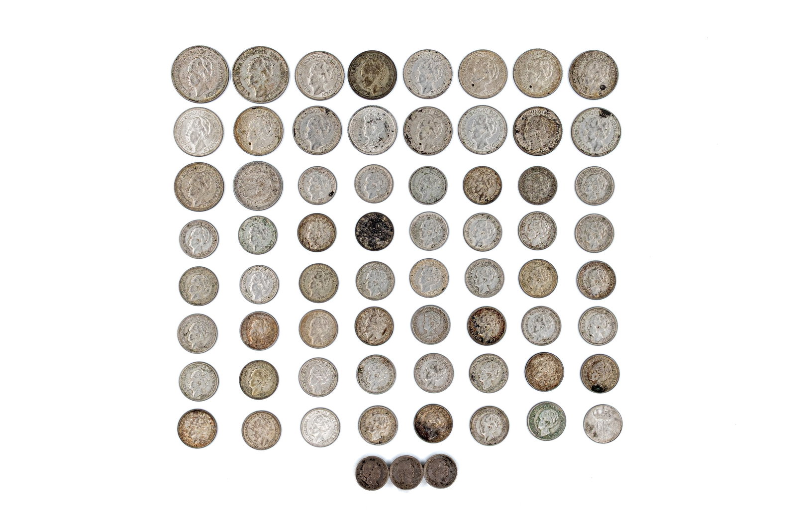 A lot of 64 Dutch silver coins, together with a brooch mounted with three coins (1 of 2)