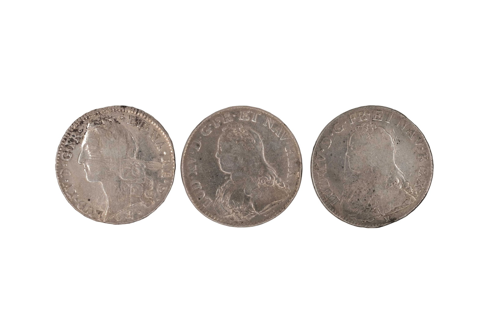 A lot of three French silver écus of Louis XV, dated 1727 and 1764: A lot of three French silver écus of Louis XV, dated 1727 and 1764. Including two early issues depicting the youthful bust of Louis XV and one later issue with mature portrait, all with crowned oval 