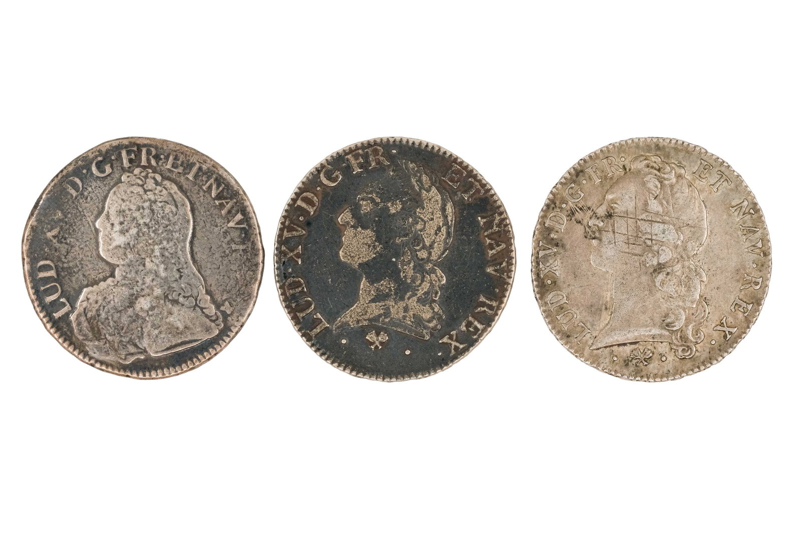 A lot of three French silver coins of Louis XV, dated 1728, 1772 and 1767: A lot of three French silver coins of Louis XV, dated 1728, 1772 and 1767. Including one early issue depicting the youthful bust of Louis XV and two later issues with mature portrait, all with crowned