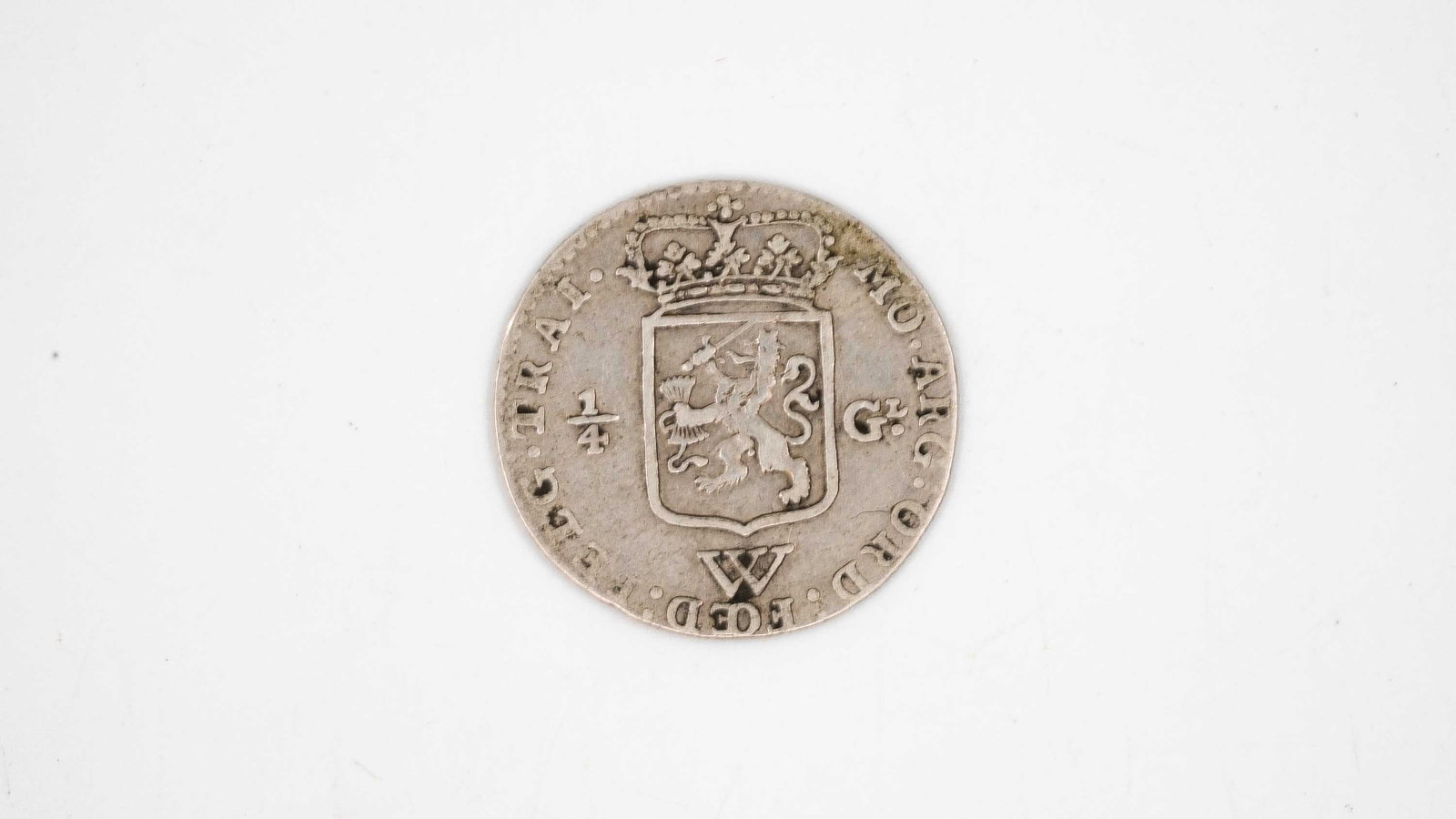 A silver 1/4 Gulden coin of the Dutch Republic, Province of Gelderland: A silver 1/4 Gulden coin of the Dutch Republic, Province of Gelderland, dated 1794. Obverse with standing armed figure holding a spear and liberty cap, resting on a pedestal. Reverse with crowned shie
