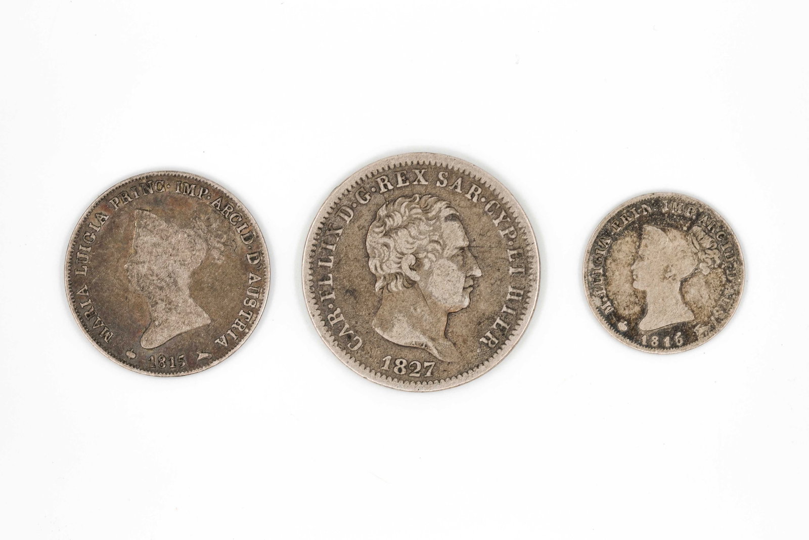 A lot of three European silver coins: A lot of three European silver coins. Comprising various types with portrait busts on the obverse and crowned arms or monogram designs on the reverse. Weight: 4,8 - 9,6 - 2,4g