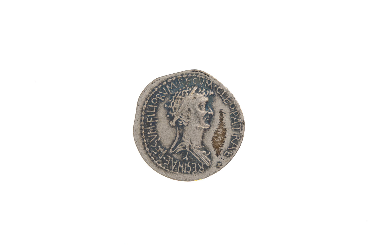 A silver Roman provincial coin associated with Mark Antony: A silver Roman provincial coin associated with Mark Antony. Obverse with bust of Antony, legend referring to Armenia devicta. Reverse with male bust, legend referring to Cleopatra and royal lineage. W