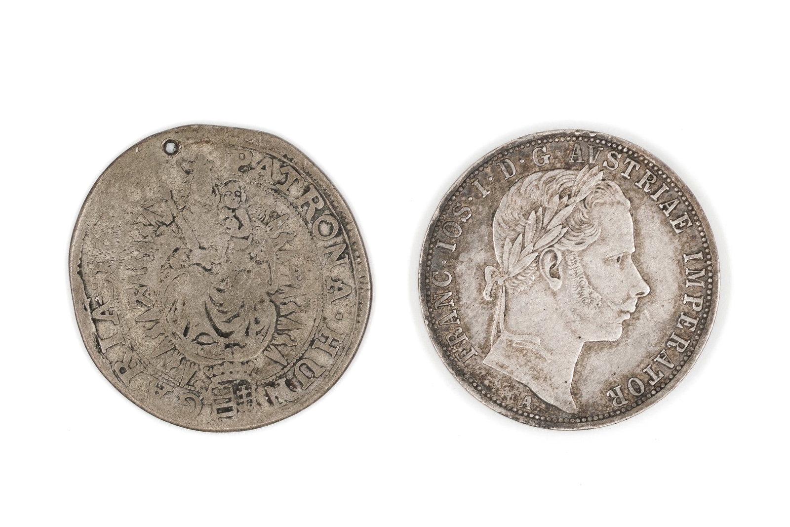 A lot of two silver coins, one dated 1861: A lot of two silver coins, one dated 1861. Comprising an earlier Hungarian issue with Madonna and Child and "Patrona Hungaria" reverse, and a 1 Florin of Franz Joseph I, with laureate head and crowned