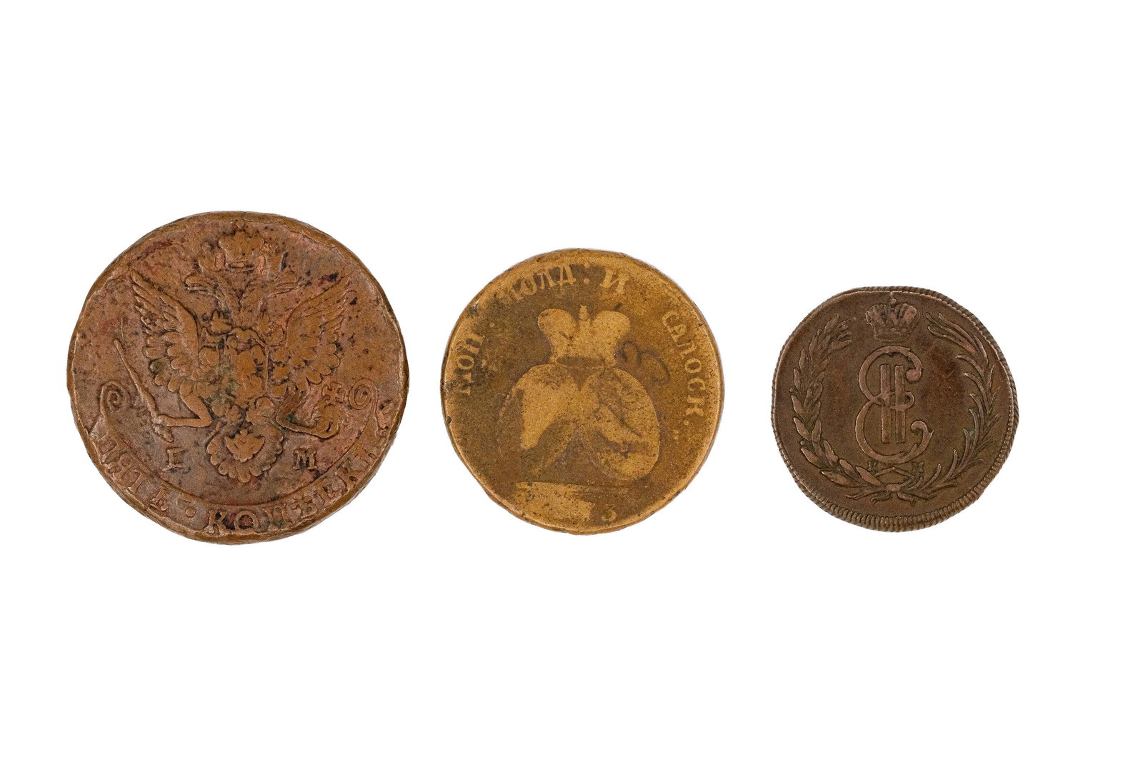 A lot of three copper coins, including Russian issues and a Siberian coin: A lot of three copper coins, including Russian issues and a Siberian coin. With imperial and crowned monograms, and reverses featuring denominations and arms within wreaths or borders. Weight: 55,2 - 
