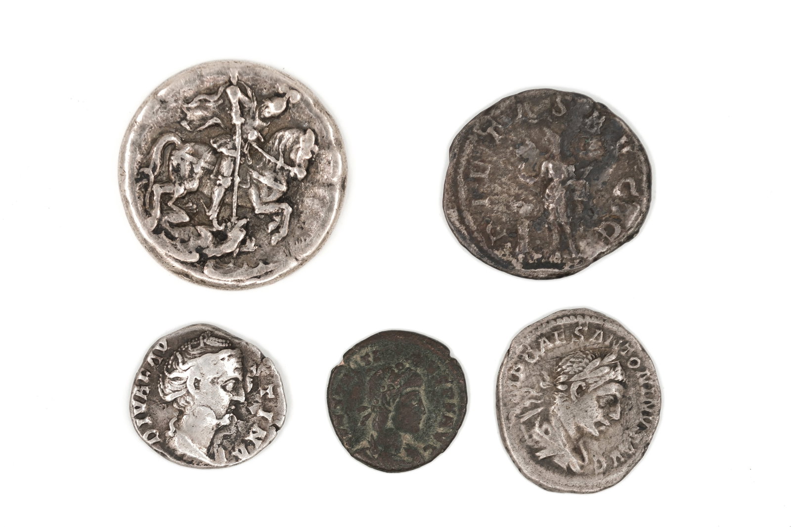 A lot of five ancient coins, comprising Roman silver and bronze issues: A lot of five ancient coins, comprising Roman silver and bronze issues. With various imperial portraits on the obverse and a range of reverse types including standing figures, an equestrian scene, and