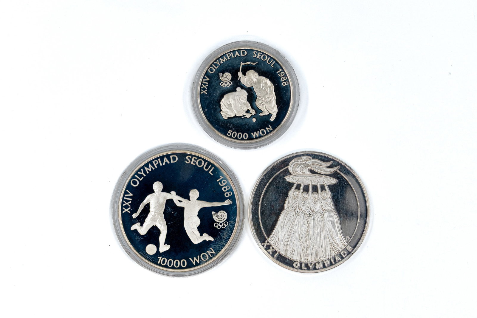 A lot of three modern Olympic silver commemorative coins, late 20th century (1 of 2)