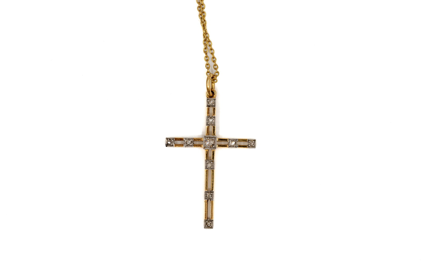 An antique 18k gold cross pendant with chain and set with eight rose-cut diamonds (1 of 3)