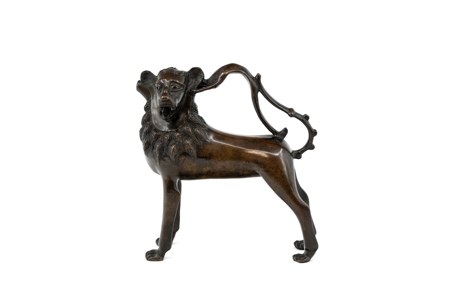A rare antique patinated bronze aquamanile in the form of a lion (1 of 10)