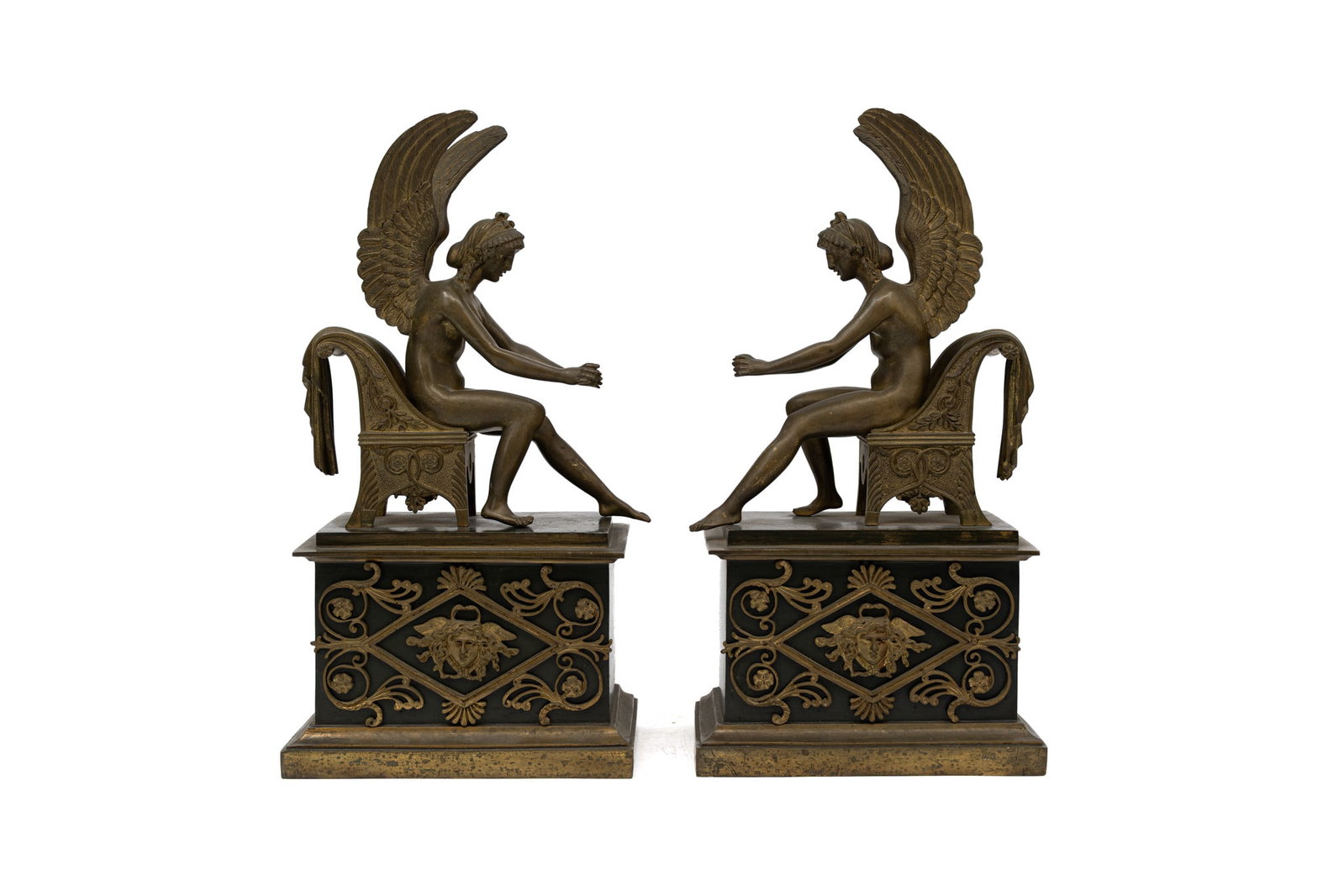 A pair of antique French Empire style gilt bronze figural andirons: A pair of antique French Empire style gilt bronze figural andirons. 19th century. H: 34,5 - W: 18 - D: 10 cm