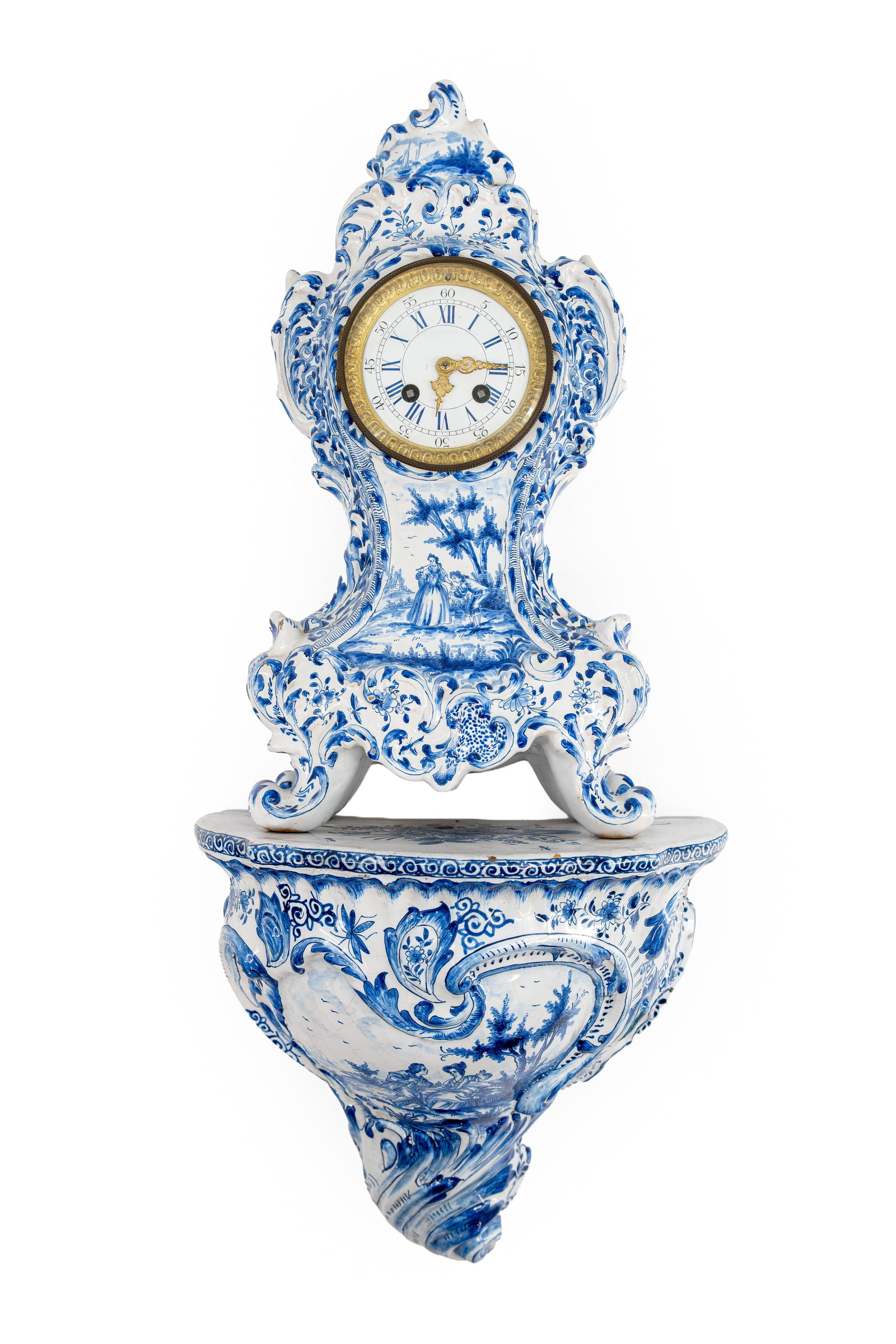 An antique dutch Delft style blue and white decorated ceramic clock and matching console (1 of 12)