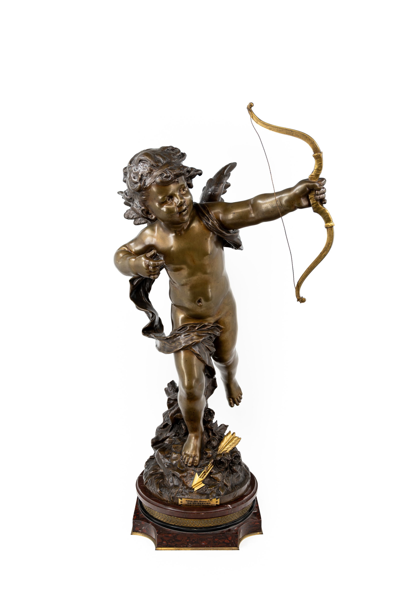 Auguste MOREAU (1834-1917) "Première Flèche". A Large antique gilt and patinated bronze sculpture: Auguste MOREAU (1834-1917) "Première Flèche". A Large antique gilt and patinated bronze sculpture of Cupid shooting his first arrow. Footed on a rotating marble base. Signed, late 19th century. H: 8